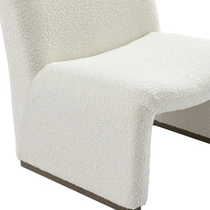 Close-up of the Beau textured bouclé chair showing its soft textured bouclé fabric, refined tailoring and premium upholstery detail.