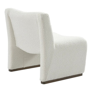 Rear angled view of the Beau White Bouclé Armchair highlighting its sculptural curved profile, textured bouclé fabric and elegant mid-century modern design for contemporary Australian interiors.