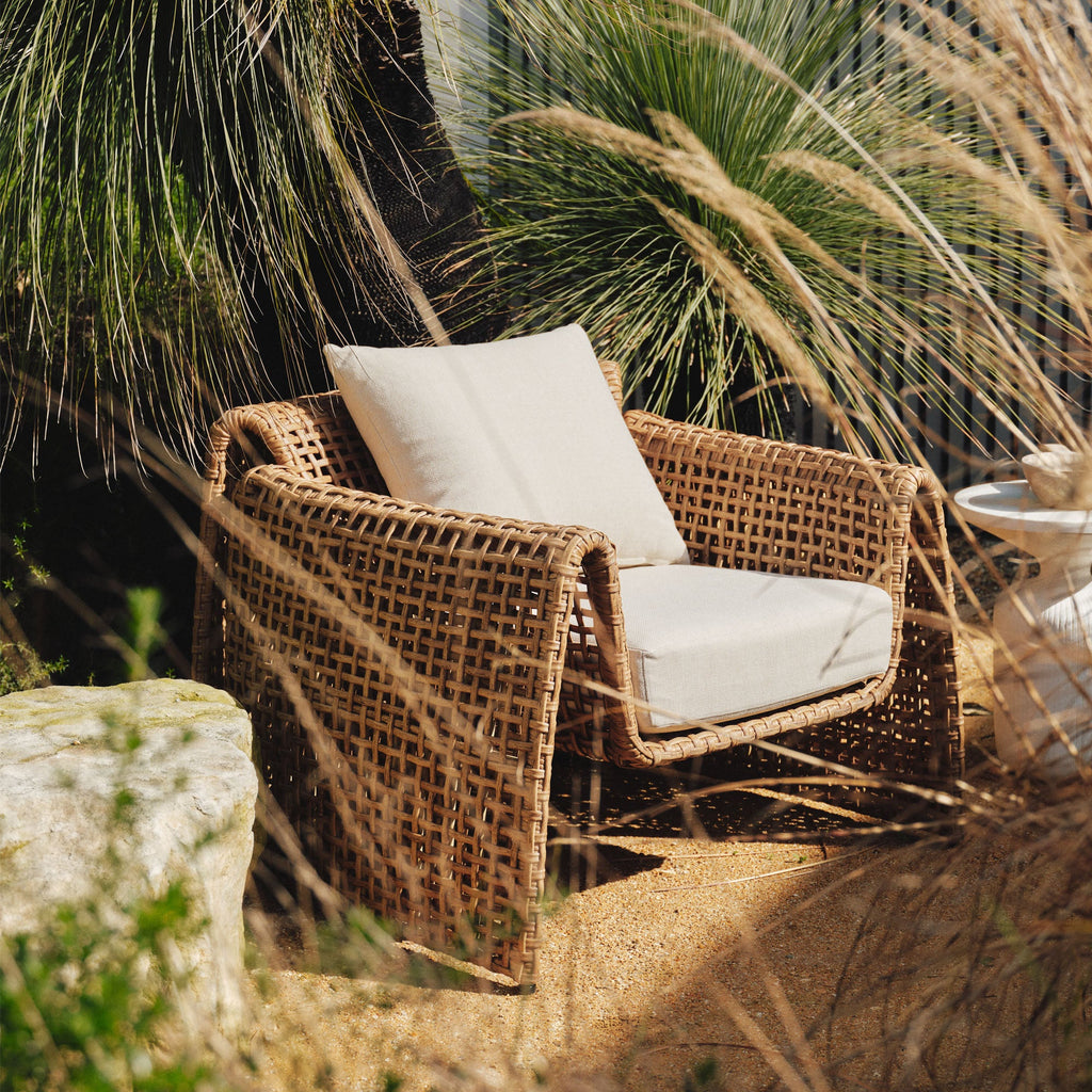 luxury outdoor armchair Australia, PE wicker outdoor chair, natural rattan look armchair, weather-resistant outdoor seating, Hamptons outdoor armchair, coastal outdoor chair, high-end outdoor lounge chair, all-weather outdoor armchair, modern resort outdoor furniture