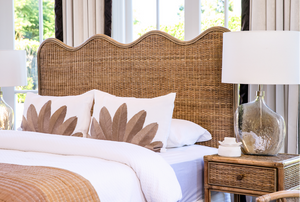luxury rattan bedhead Australia, coastal bedroom furniture, handcrafted rattan bedhead, Hamptons style bedhead, natural rattan bedhead King Queen, resort style bedroom decor, ethical rattan furniture, modern organic bedroom style, Interior Collections, wave design bedhead, Wisteria Design furniture