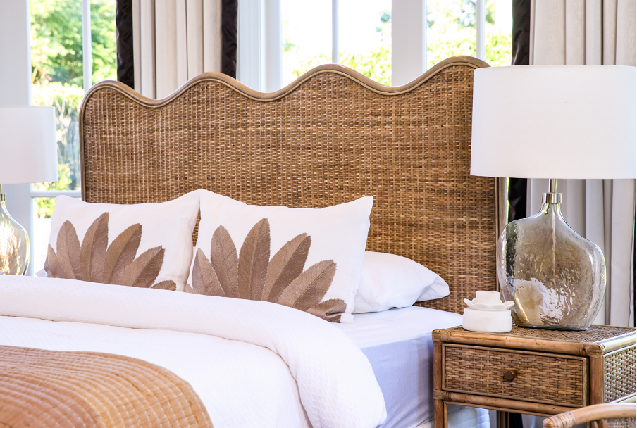 luxury rattan bedhead Australia, coastal bedroom furniture, handcrafted rattan bedhead, Hamptons style bedhead, natural rattan bedhead King Queen, resort style bedroom decor, ethical rattan furniture, modern organic bedroom style, Interior Collections, wave design bedhead, Wisteria Design furniture