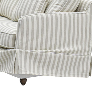 skirt of the Noosa Hamptons Stripe Sofa, a luxury slipcover sofa upholstered in beige and white striped fabric, designed for Hamptons, coastal, modern farmhouse and classic Australian living rooms.