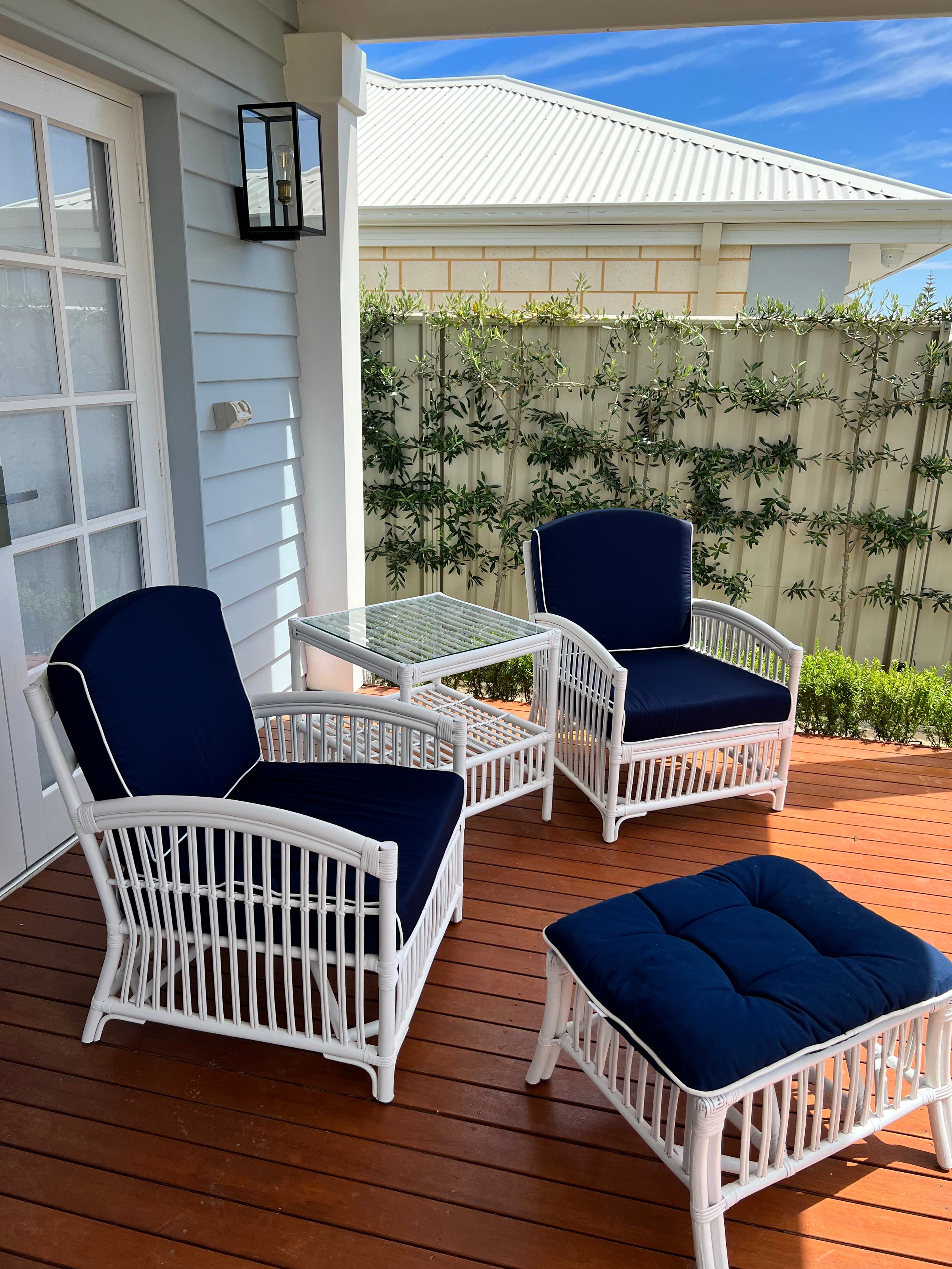 White cane armchair deals